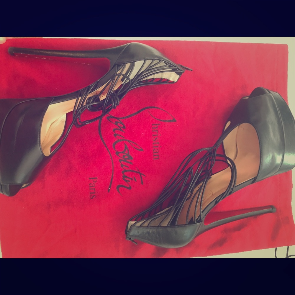 Christian Louboutins black strappy heels